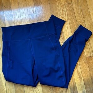 Lulu Lemon Blue leggings with mesh bottoms Size 12